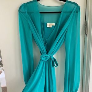 Flirty mini dress with tassel belt